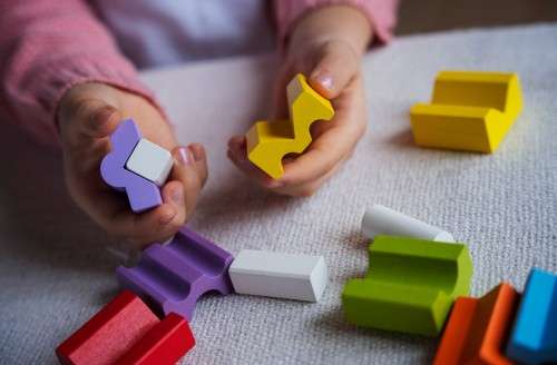 photo high angle girl playing memory game