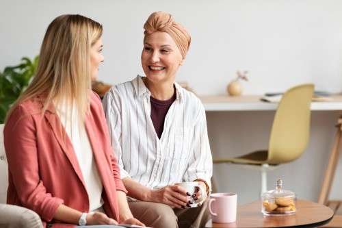 Two women having a pleasant conversation.