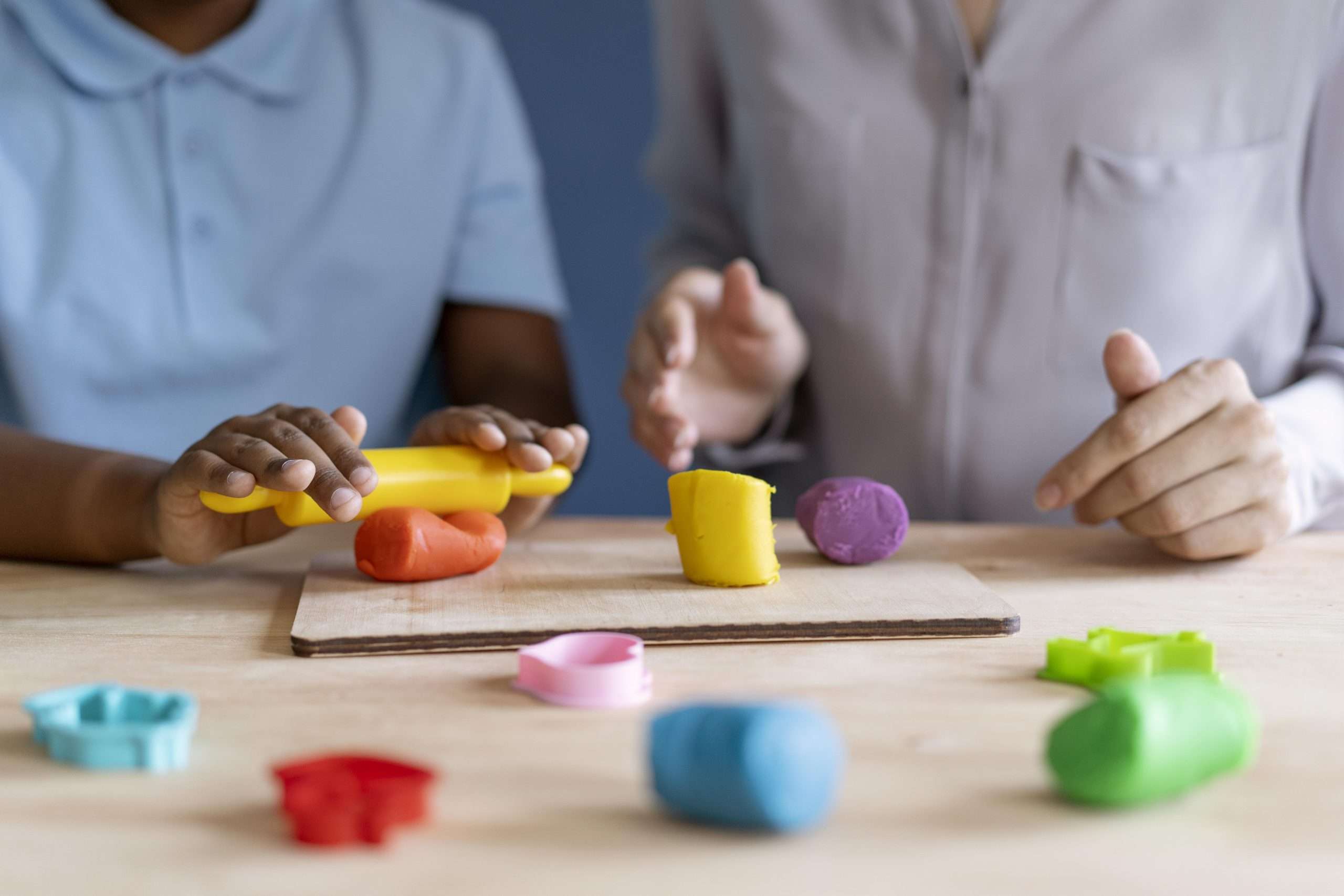 kid-doing-occupational-therapy-session-with-psychologist